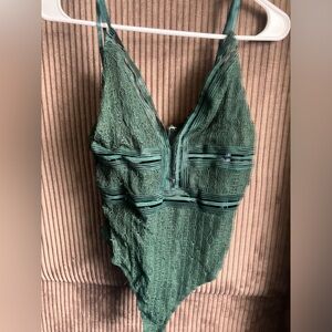 Women’s green bodysuit